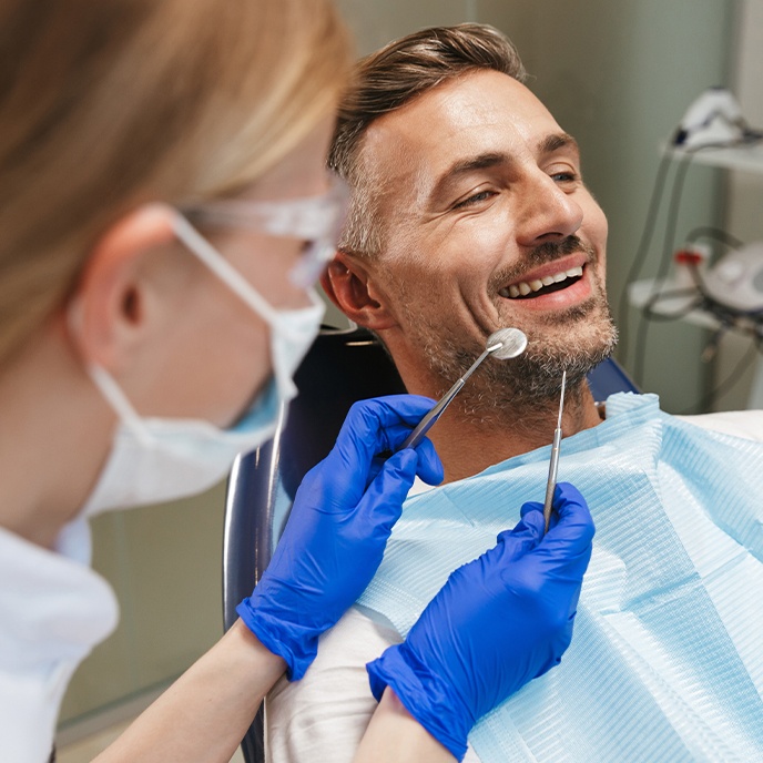 Man receiving dental treatment