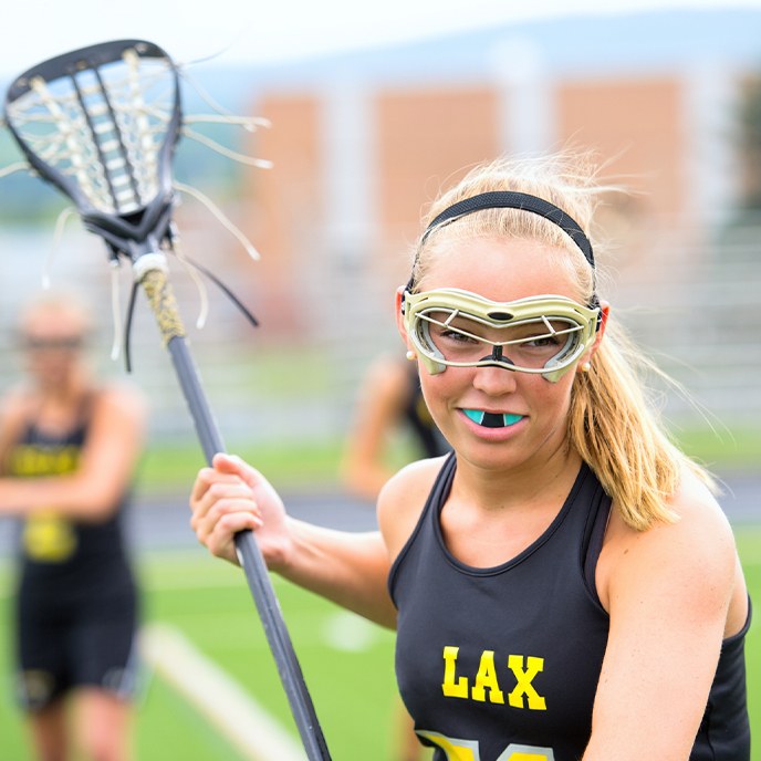 Teen girl wearing athletic mouthguard