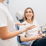 patient talking to dentist about cost of cosmetic dentistry 