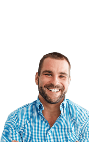 Man in blue and white plaid shirt grinning