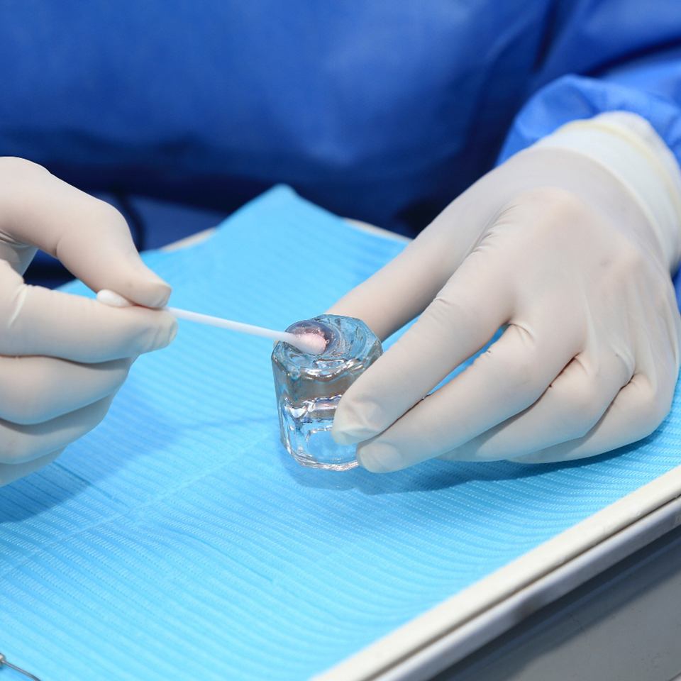 Dentist mixing up fluoride gel for application