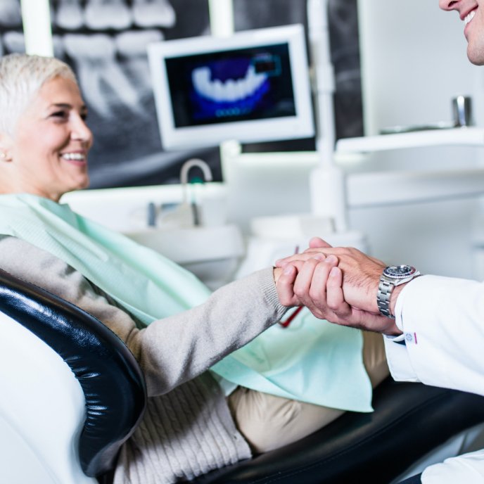 Patient learns how dental implants work in St. Johns