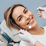 patient getting checkup to prevent dental emergencies in St. Johns