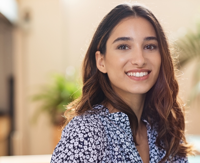 Woman with gorgeous smile after cosmetic dentistry