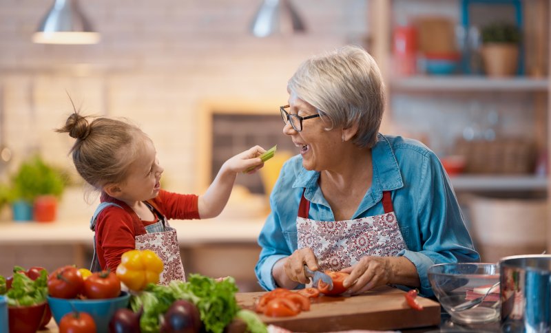 a mature woman tasting food with dentures in Fruit Cove 