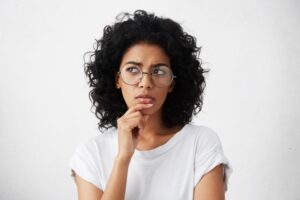 Woman wondering if she needs a root canal without feeling pain